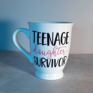 Mud Pie White Mug with Black and Pink Text. Teenage Daughter Survivor.